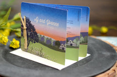 Spring Mountain Sunset with Wildflower Landscape 3pg Livret Wedding Invitation with Envelopes and RSVP Postcard / Wedding Timeline Agenda